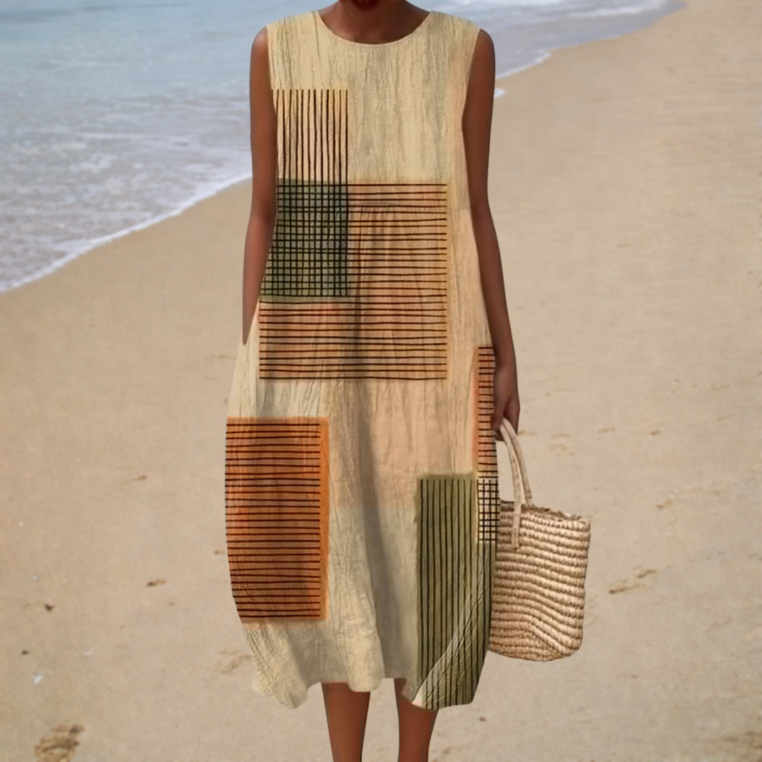Robe midi graphique Aurélie de Danoir Paris, vêtement tendance pour femmes, avec motif coloré et coupe élégante.