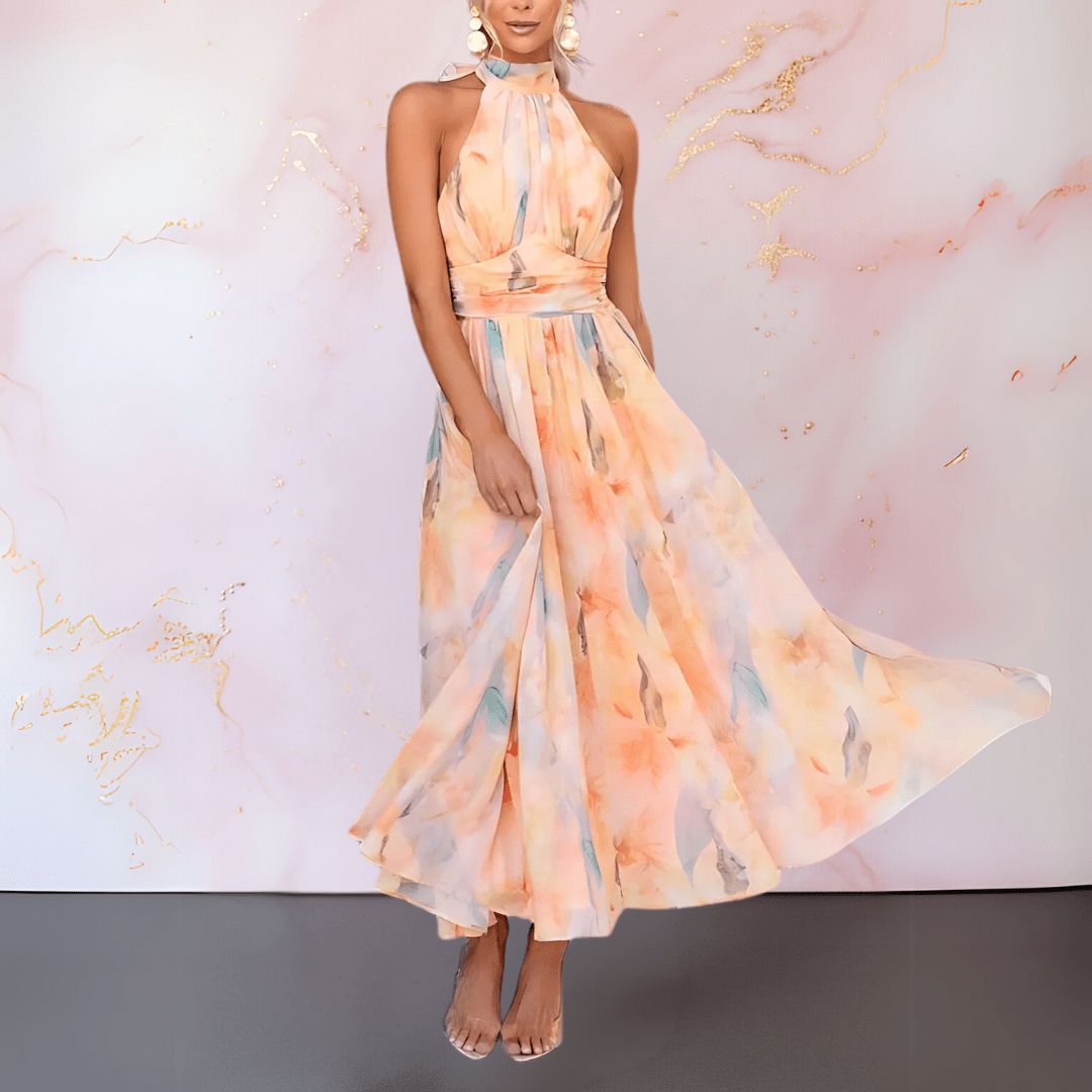Robe Danoir Paris ESTHER à imprimé aquarelle, coupe ajustée, col halter, élégante et fluide, idéale pour l'été.