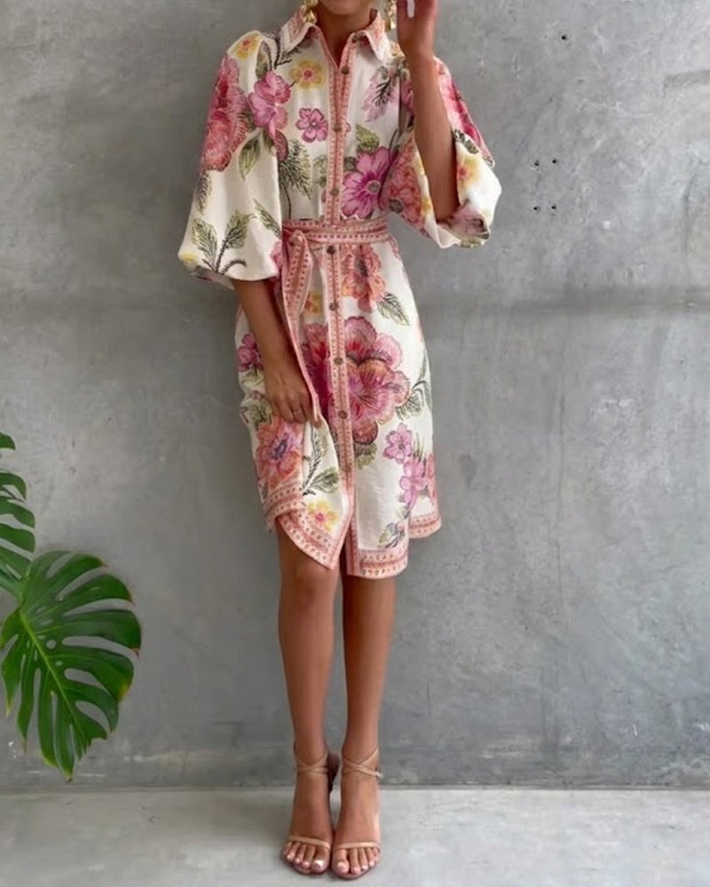 Robe manches lanternes à col cranté et imprimé par Danoir Paris, vue de face, tissu léger et élégant.