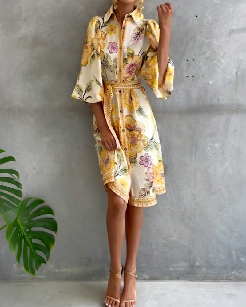 Robe Danoir Paris manches lanternes, col crochet et imprimé floral, tissu léger et fluide, portée élégante et estivale.