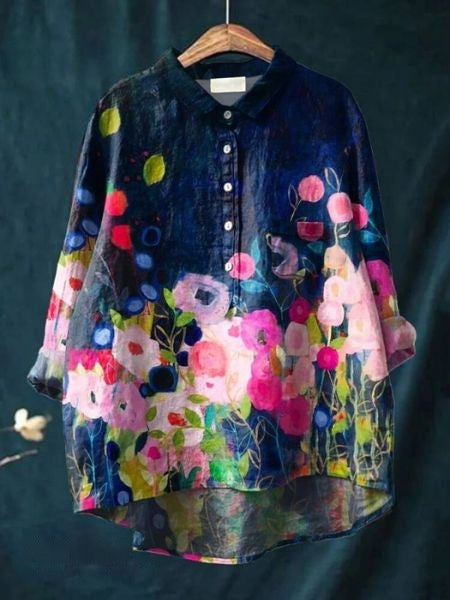 Blouse florale élégante Lila de Danoir Paris, en tissu léger avec motif floral coloré, portée sur mannequin blanc.