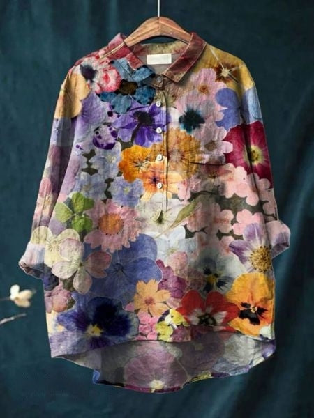 Blouse florale élégante Lila de Danoir Paris, tissu léger avec motifs floraux colorés, portée décontractée ou chic.
