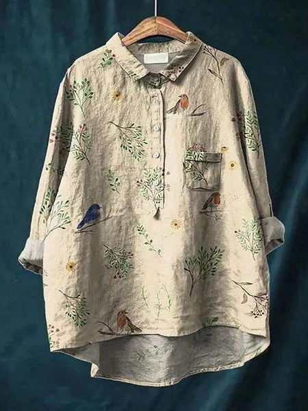 Blouse florale élégante Lila de Danoir Paris, tissu léger avec motifs floraux, manches longues et coupe raffinée.
