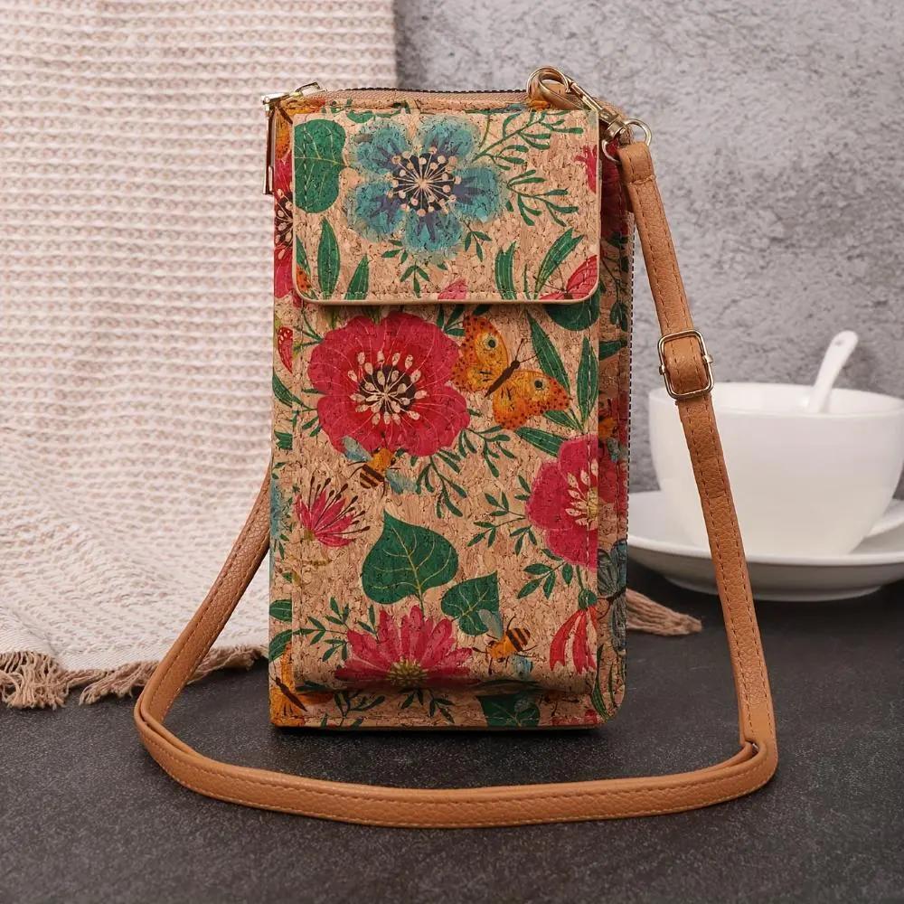 Sac à épaules Nina Danoir Paris avec motifs floraux bohèmes, accessoire de mode élégant et coloré pour femmes.