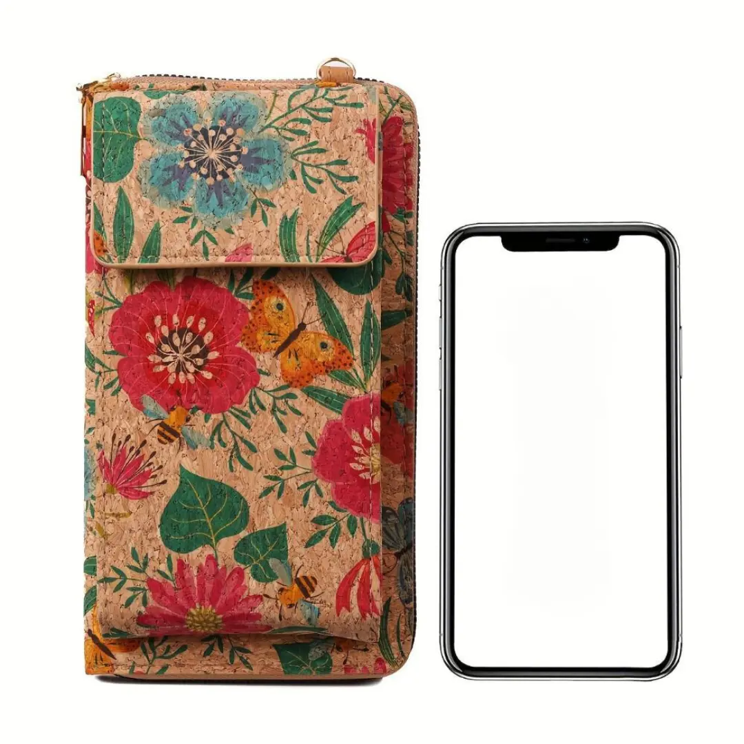 Sac bandoulière boho à fleurs Nina de Danoir Paris, en tissu coloré avec motifs floraux et bandoulière ajustable.