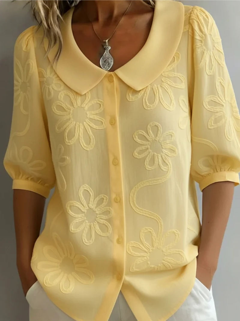 Blouse confortable florale Sara de Danoir Paris, motif fleuri, tissu léger, style décontracté et féminin.