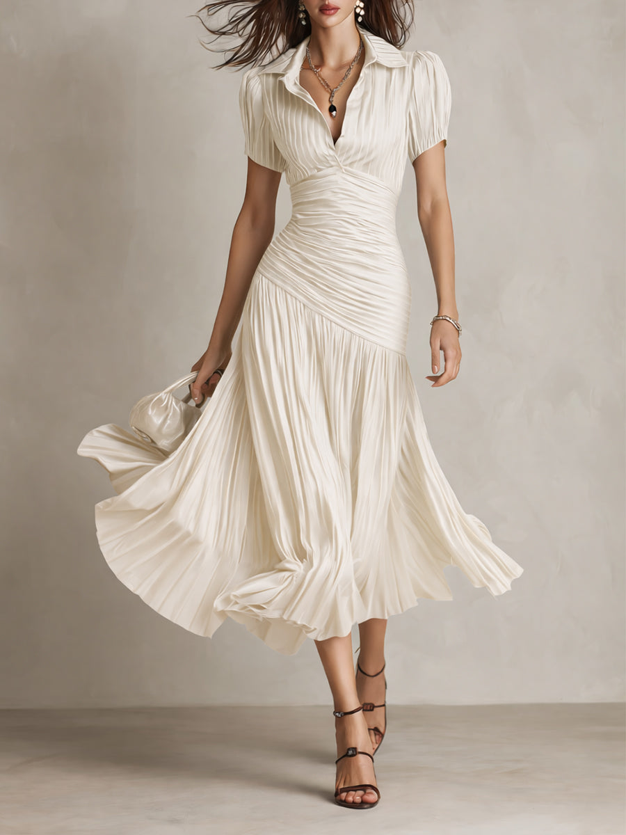 Robe satinée Manon de Danoir Paris, élégante et fluide, couleur noire, avec décolleté en V et détails sophistiqués.