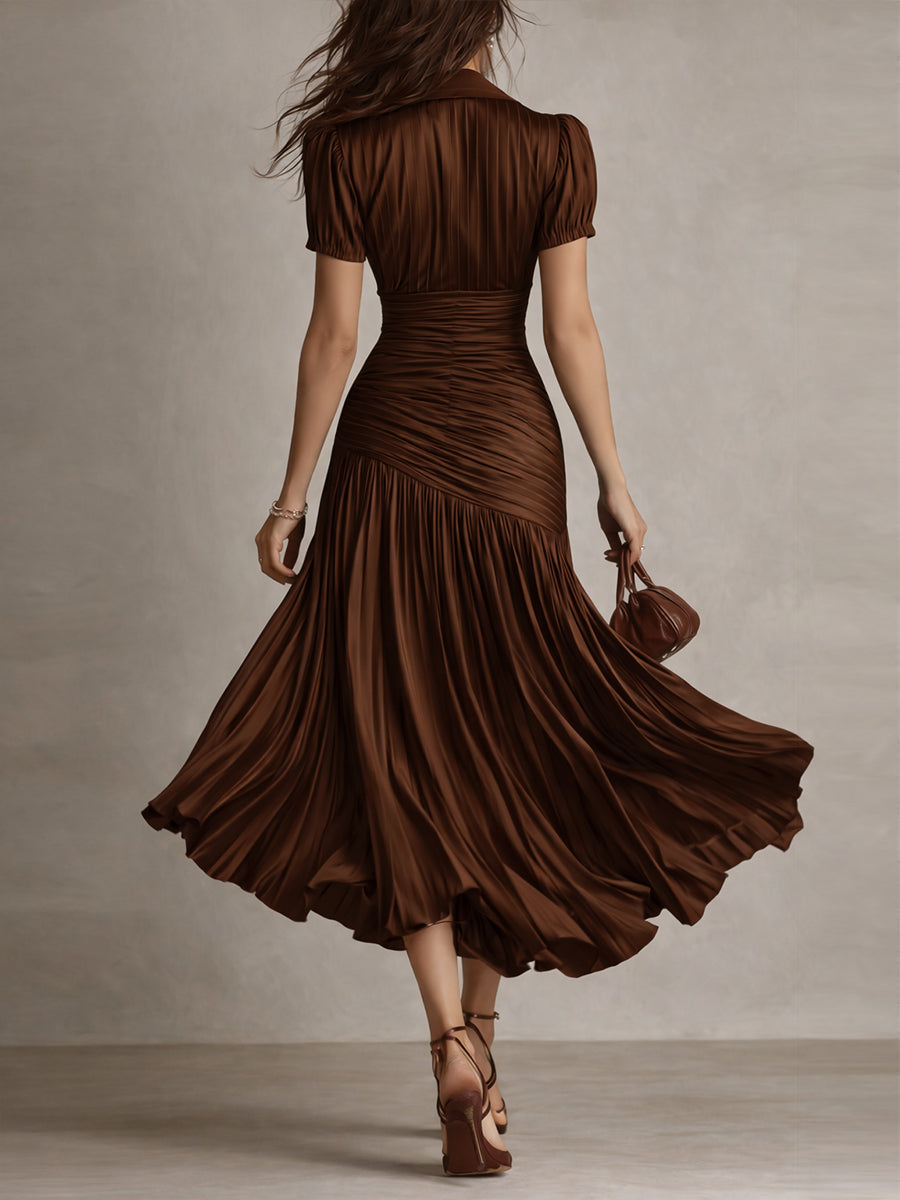 Robe satinée Manon de Danoir Paris, élégante robe courte avec finition brillante et détails sophistiqués, vue de face.