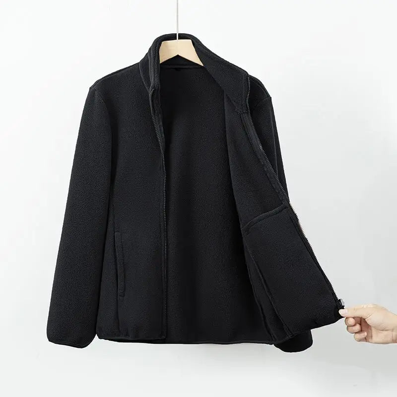 Veste polaire élégante Nora de Danoir Paris, noir, coupe ajustée et confort, pour un style chic et chaud en hiver.