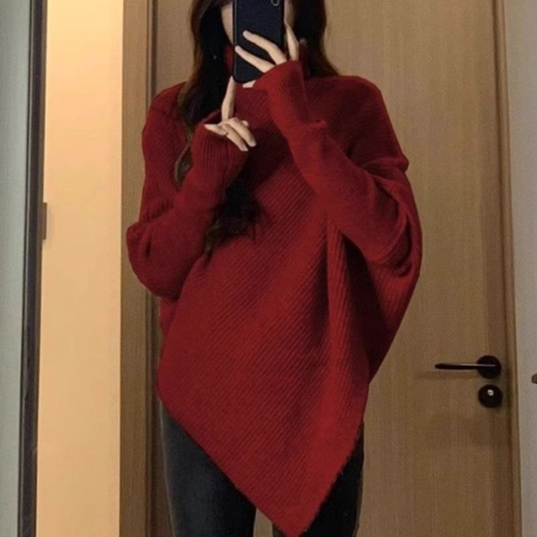 Poncho Anneta Danoir Paris, pull confortable en maille douce, porté de face avec col ample et manches longues.