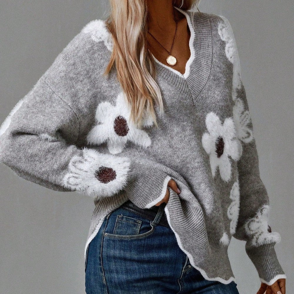 Pull floral élégant Thea de Danoir Paris, en tissu léger, avec motif fleuri coloré, porté sur mannequin.