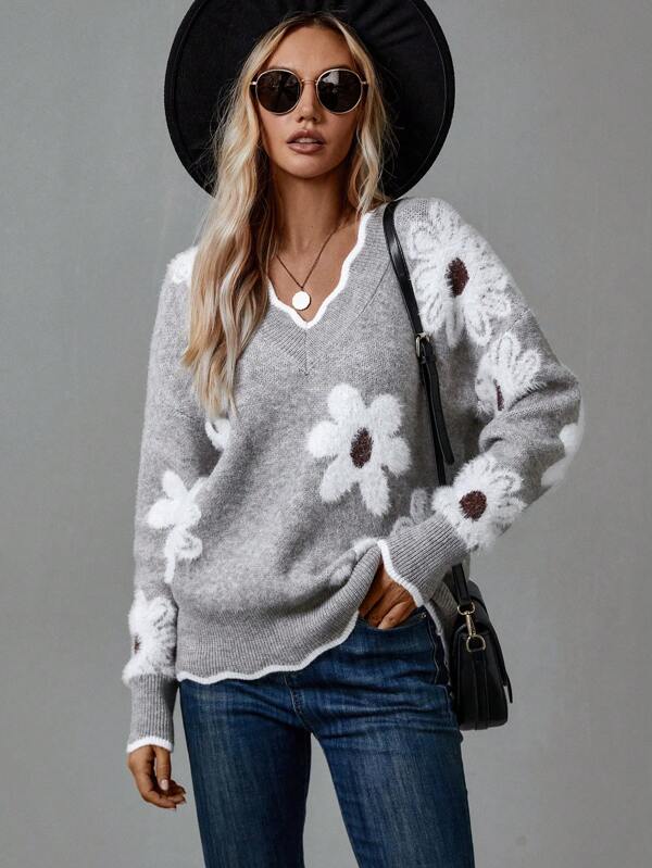 Pull floral élégant Thea de Danoir Paris, motif fleuri, en tissu doux, porté sur un mannequin, style chic et féminin.