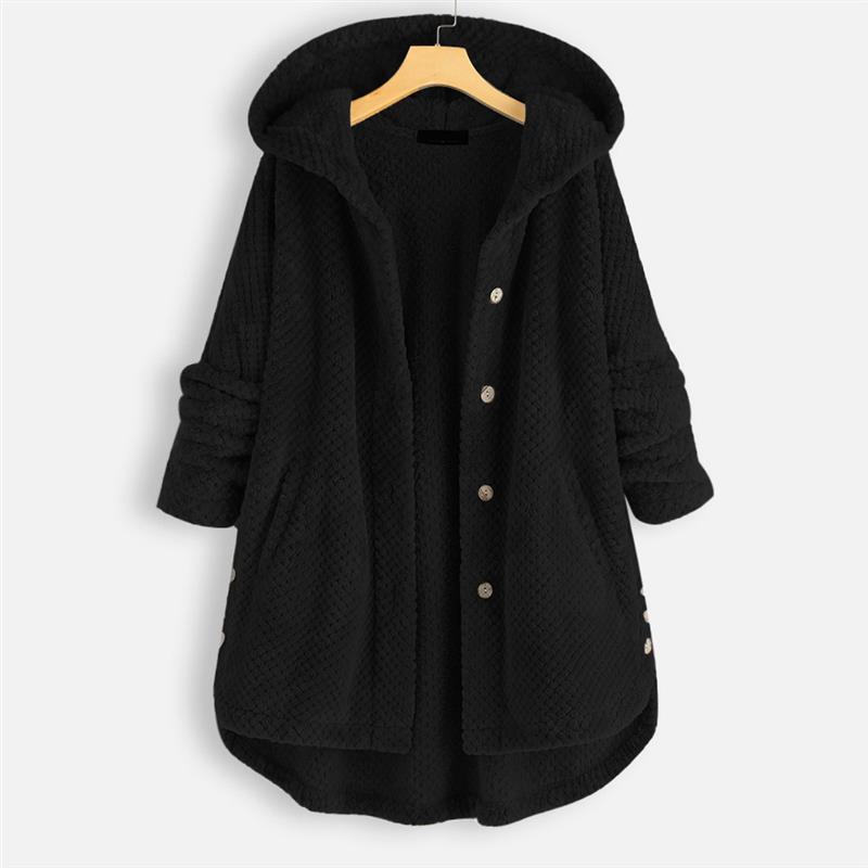 Manteau d'hiver chic Jesse de Danoir Paris, en tissu élégant, porté avec col haut et manches longues, vue de face.