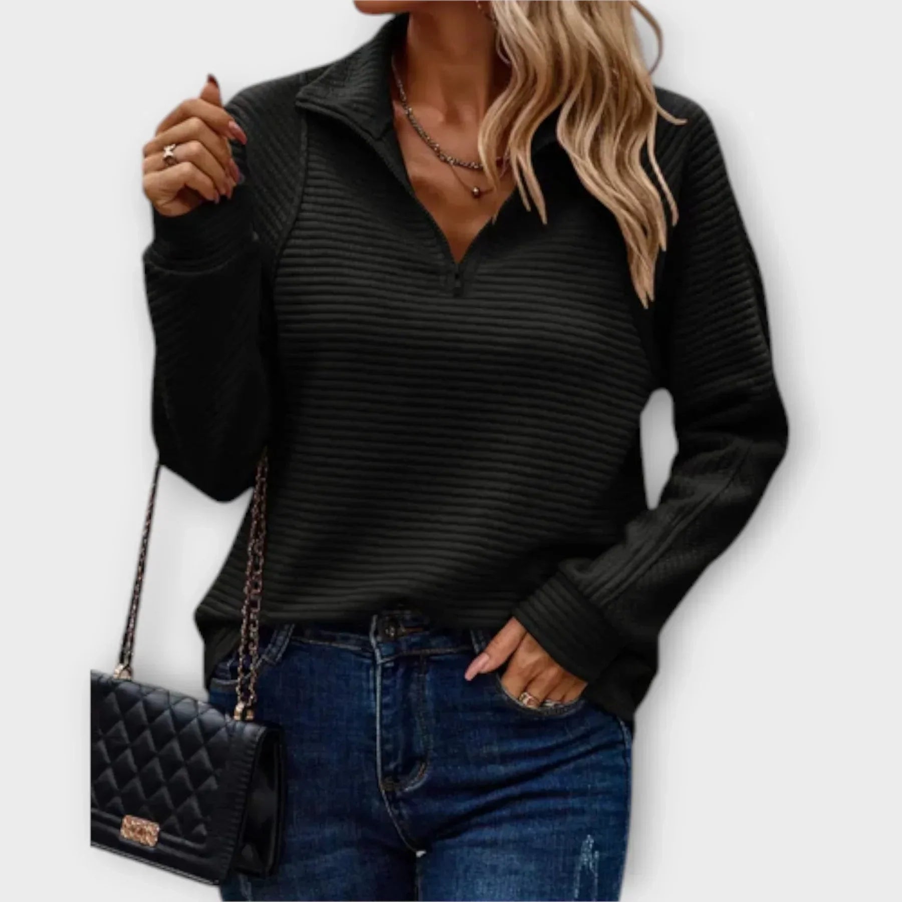 Pull chic et confortable Olivia de Danoir Paris, rose, en laine doux, porté sur un mannequin, style élégant et moderne.