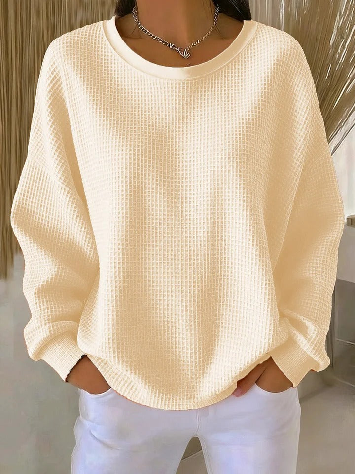 Pull Luna Danoir Paris en rose, élégant et confortable, porté par un mannequin sur un fond neutre.