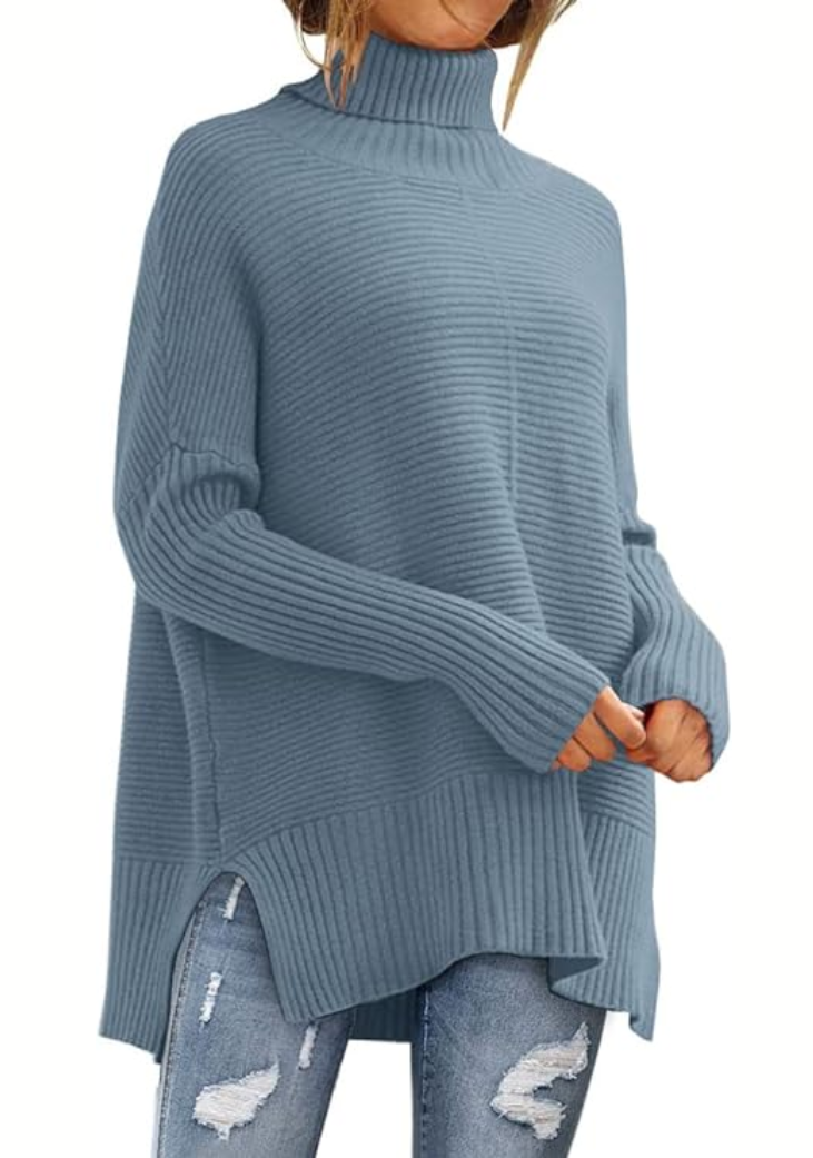 Pull roulé confortable Anna de Danoir Paris, motif automnal, en tissu doux, porté avec col rond, look chic et décontracté.