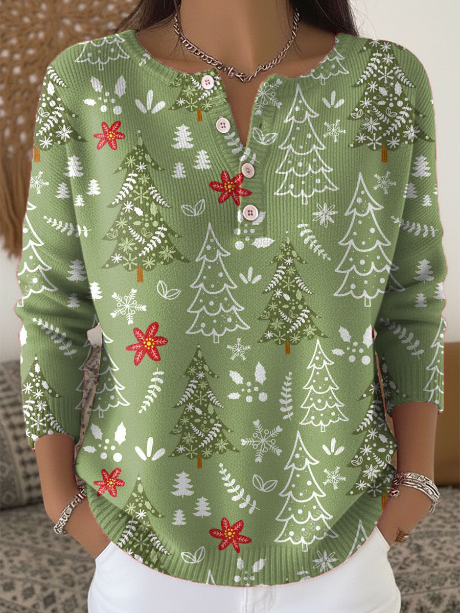 Pull de Noël festif Sofie de Danoir Paris avec motifs de fête, en laine rouge et blanche, idéal pour la saison hivernale.