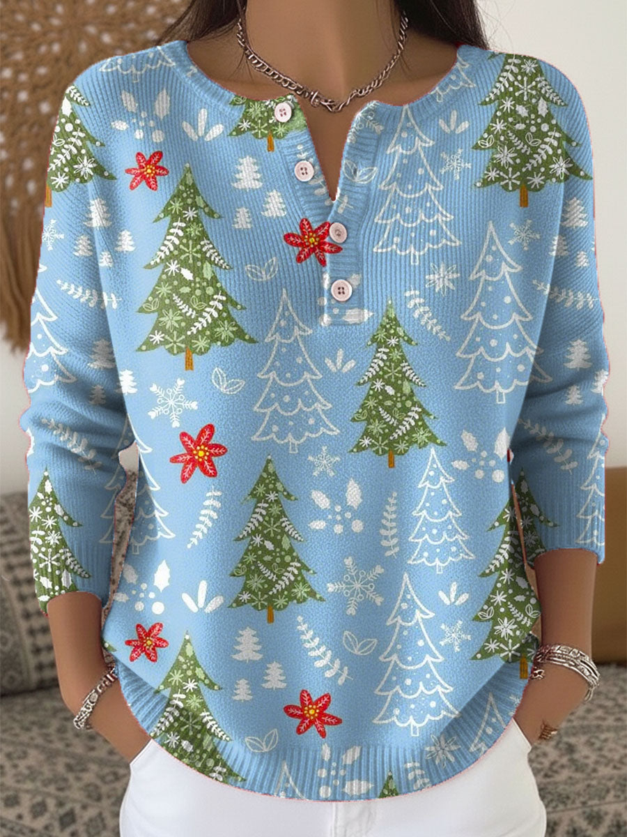 Pull de Noël festif Sofie de Danoir Paris, tricoté rouge avec motifs de fêtes, idéal pour la saison hivernale.