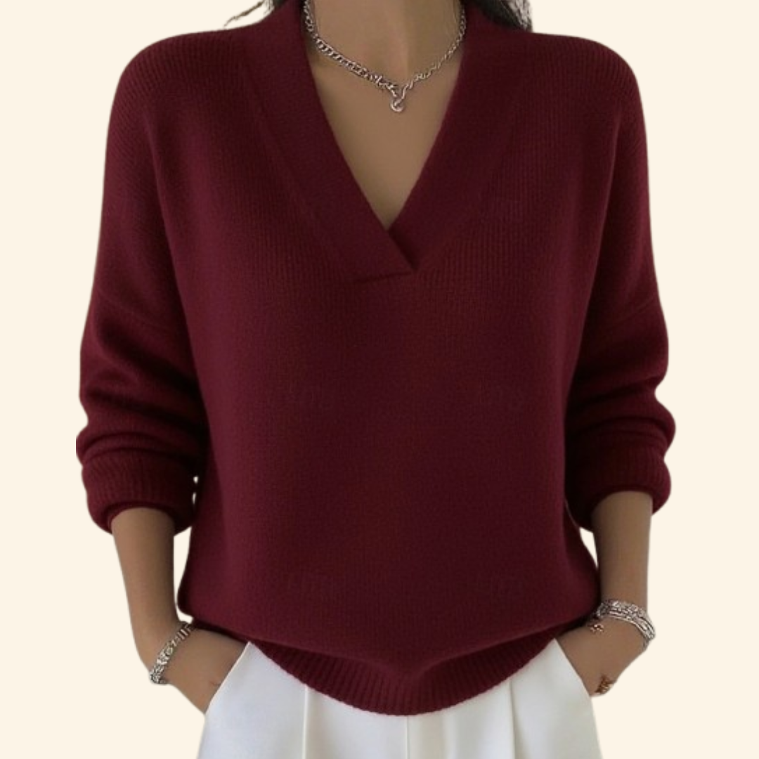 Pull Noor Danoir Paris, élégant et confortable, en tissu doux, présenté sur un mannequin avec un col rond et manches longues.