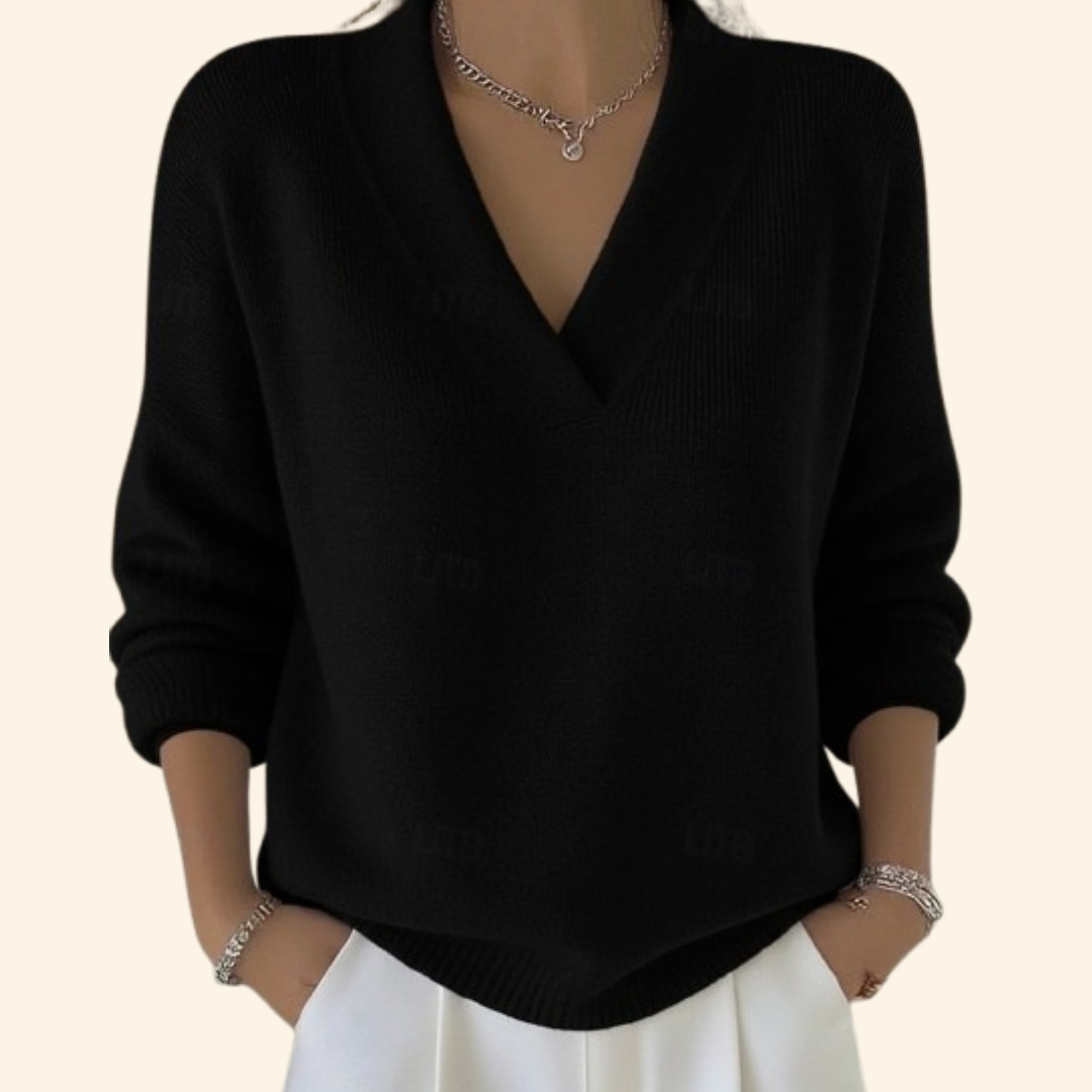 Pull Danoir Paris Noor, confortable et élégant, en tissu doux, porté par un modèle, couleur neutre, design moderne.