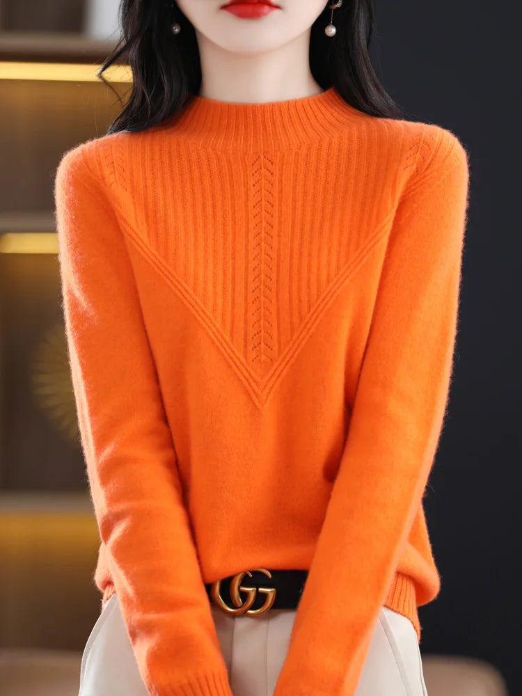 Pull en cachemire Liora de Danoir Paris, élégant, gris clair, porté sur un mannequin, détails de la texture douce et raffinée.