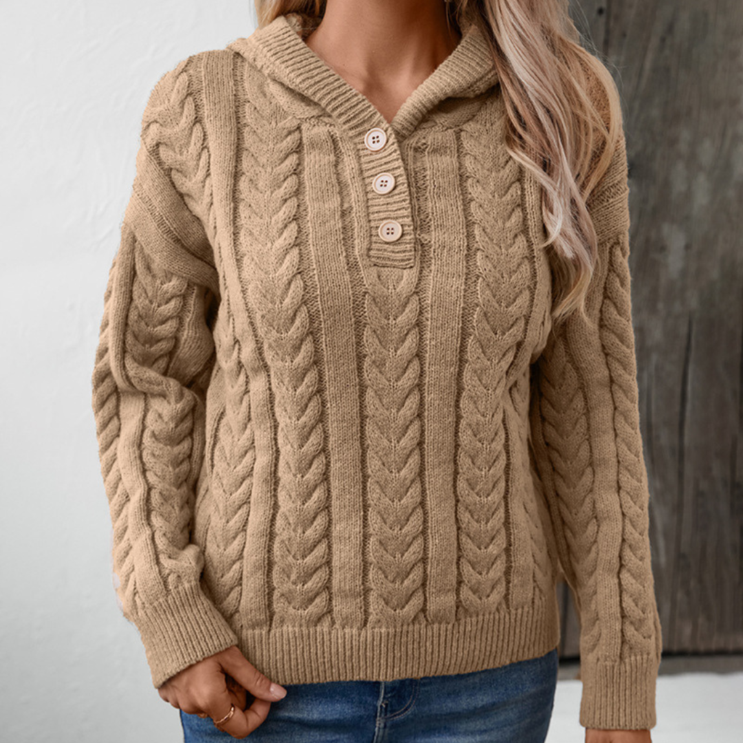 Pull Henley rose Talbot de Danoir Paris, style chic et confortable, avec col boutonné et tissu doux visible sur l'image.