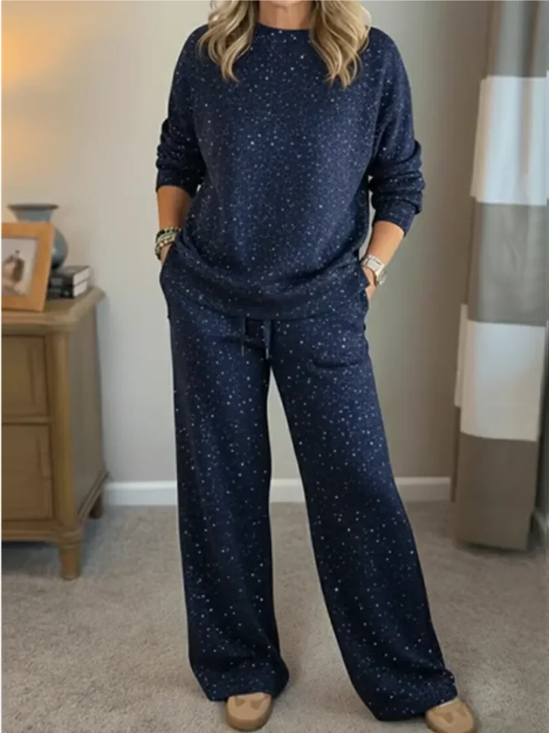 Ensemble décontracté à pois Lana de Danoir Paris, haut et pantalon confortables en tissu léger, motif à pois noir et blanc.