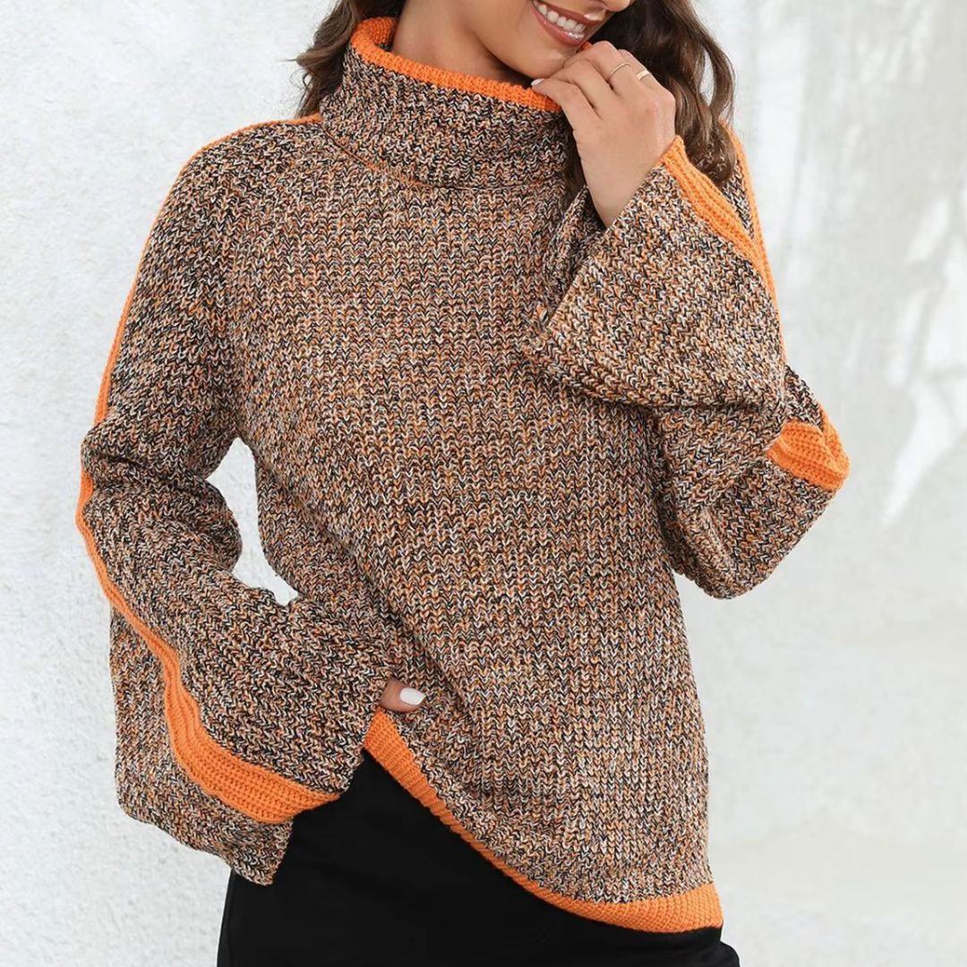 Pull patchwork chic Danoir Paris Diana FR1408 avec motifs variés, doux tissu et coupe élégante, porté sur mannequin.