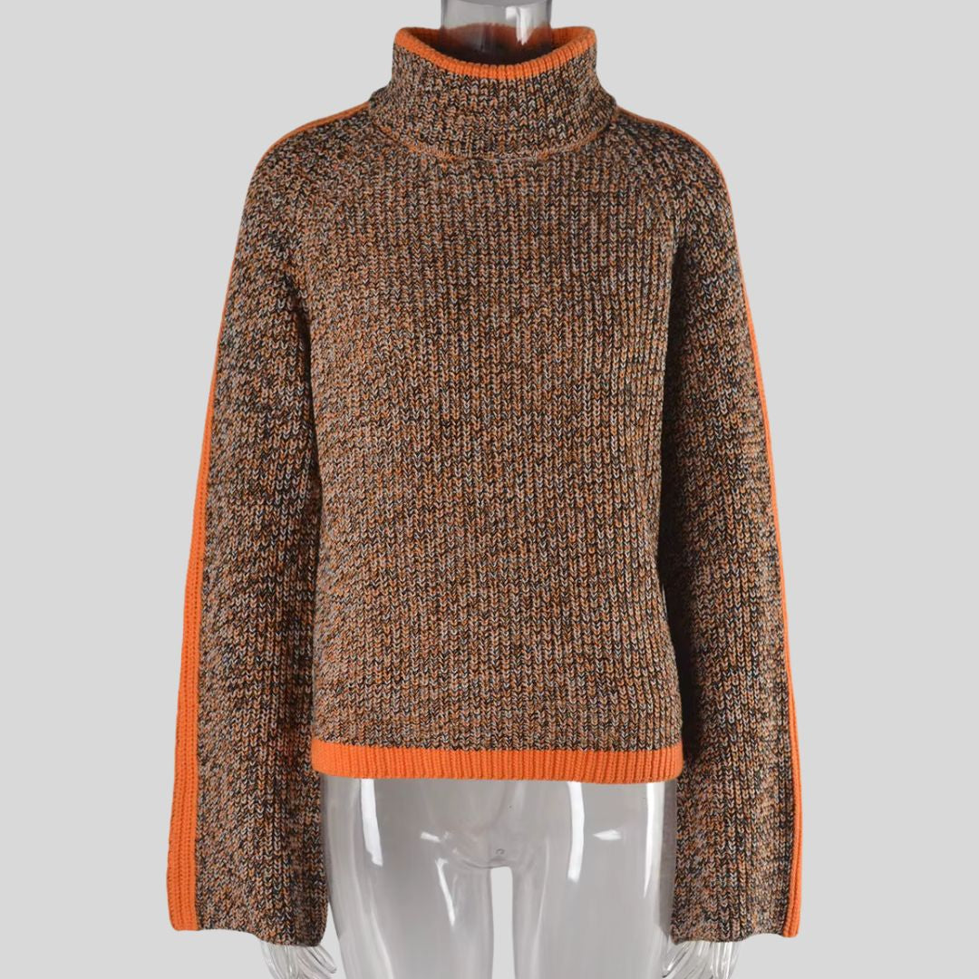 Pull patchwork chic Danoir Paris, modèle Diana, en tissu coloré avec motifs patchwork, porté sur mannequin.