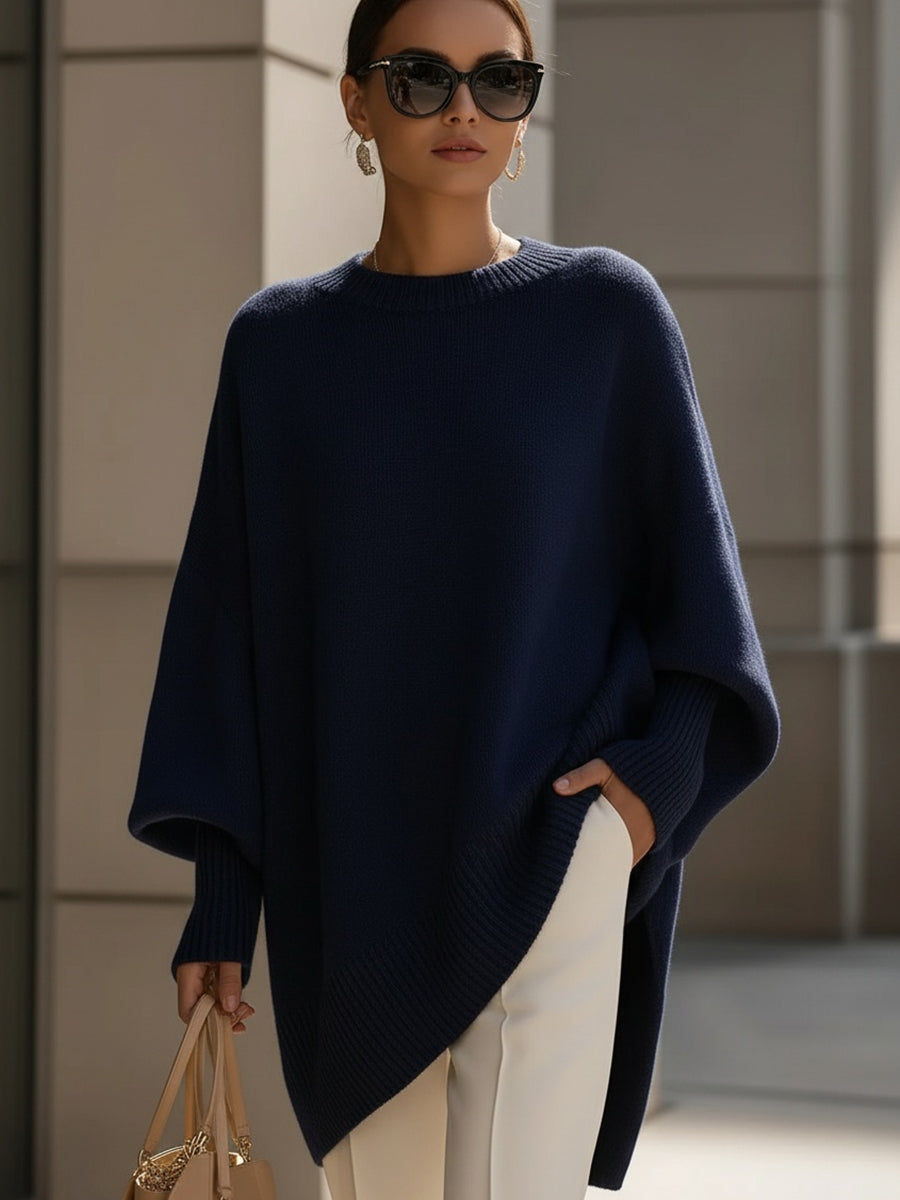 Pull élégant Claudia de Danoir Paris, en maille polyvalente, porté en style décontracté avec col rond et manches longues.