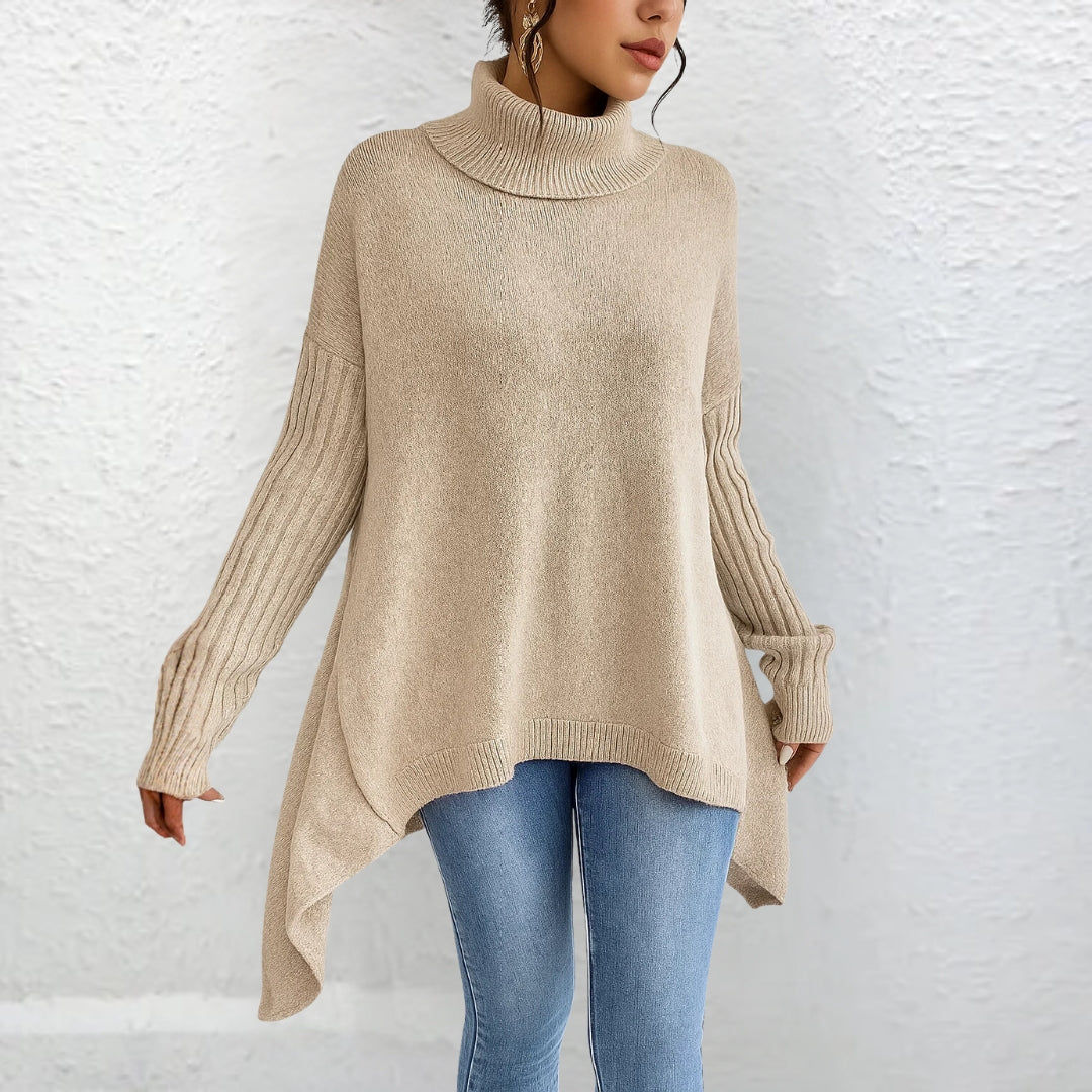 Pull polo élégant Brigitte de Danoir Paris en maille douce avec col classique et manches longues, couleur neutre.