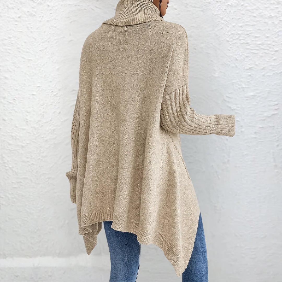 Pull polo élégant Brigitte de Danoir Paris en maille douce, porté avec col classique et manches longues.