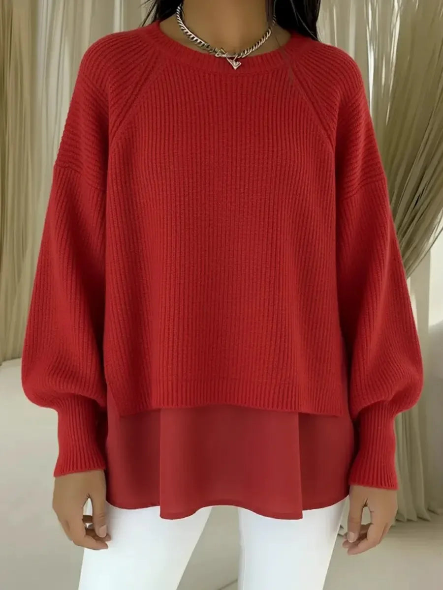 Pull noir élégant Danoir Paris, tricot doux, finition soignée, porté sur un fond neutre.