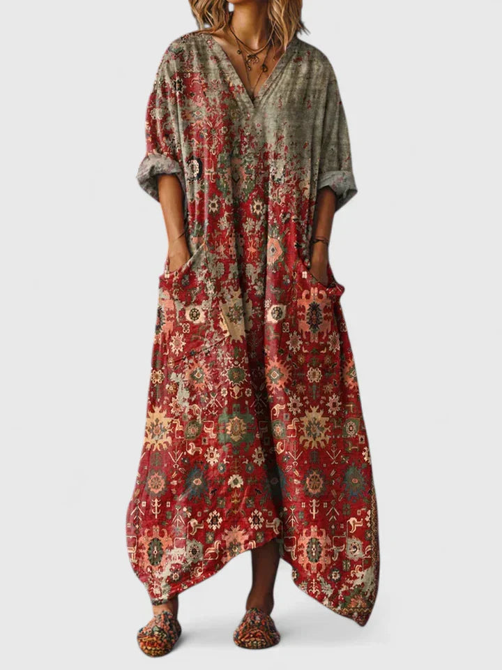 Robe élégante Danoir Paris Thalyssira FR1506 de couleur orange, style polyvalent, portée avec accessoires et chaussures élégantes.