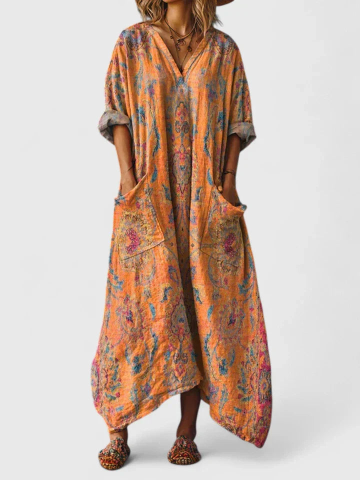 Robe élégante polyvalente Thalyssira de Danoir Paris en orange, style chic et moderne, pour diverses occasions.