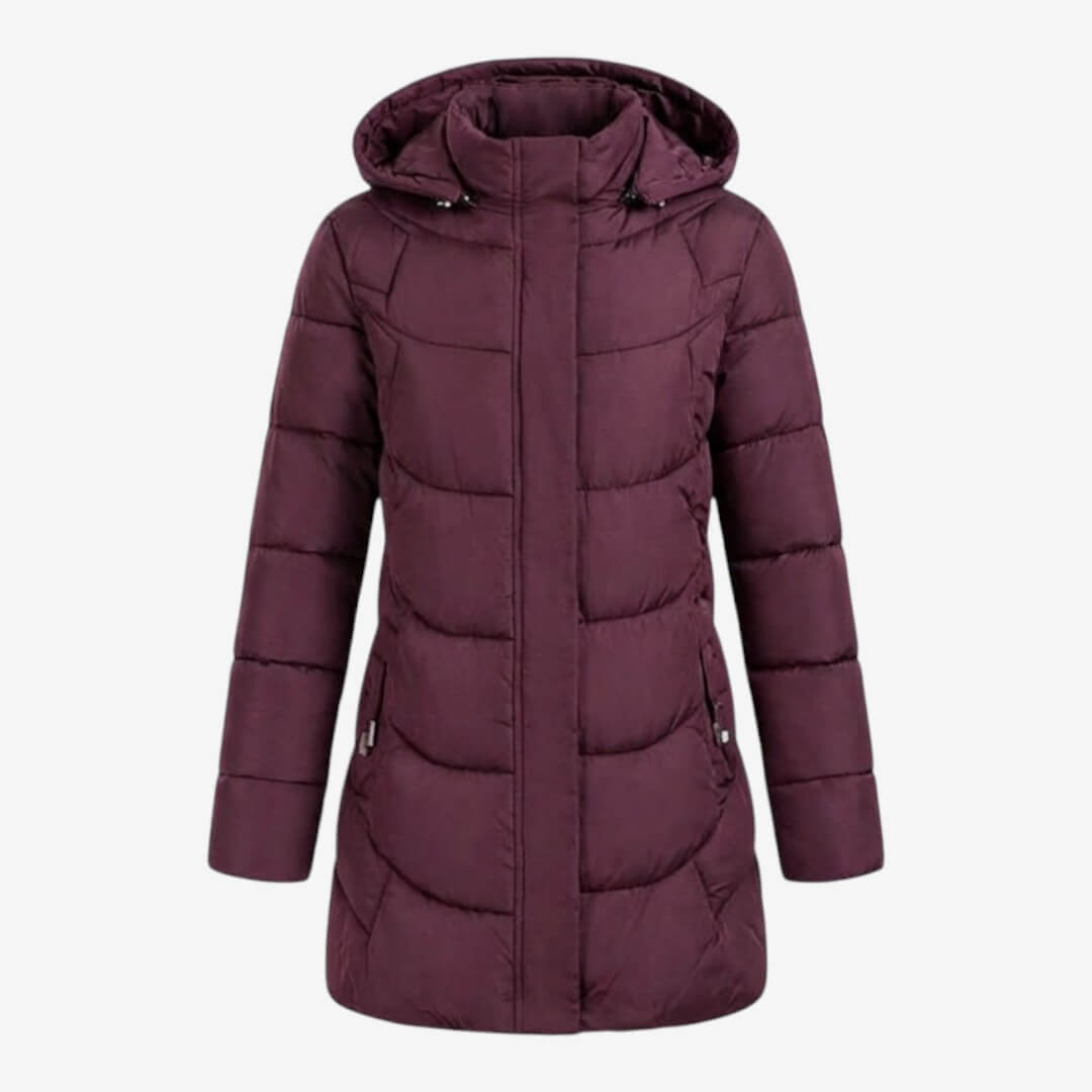 Manteau matelassé chic Adeline de Danoir Paris, style élégant, tissu rembourré, porté sur un mannequin, couleur neutre.