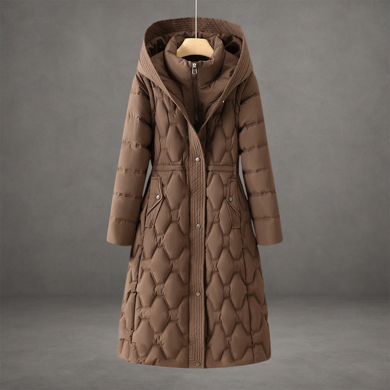 Manteau long imperméable Danoir Paris Rosemont avec capuche, style longline, adapté pour la pluie et le froid.