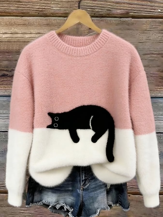 Pull doux et mignon LanaCat de Danoir Paris, en laine, avec un motif adorable, porté par un mannequin.