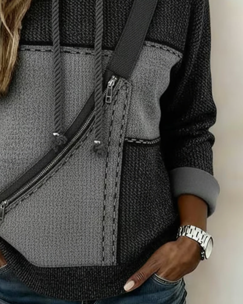 Hoodie color-block urbain Rosita de Danoir Paris, style décontracté avec design moderne en tissu confortable.