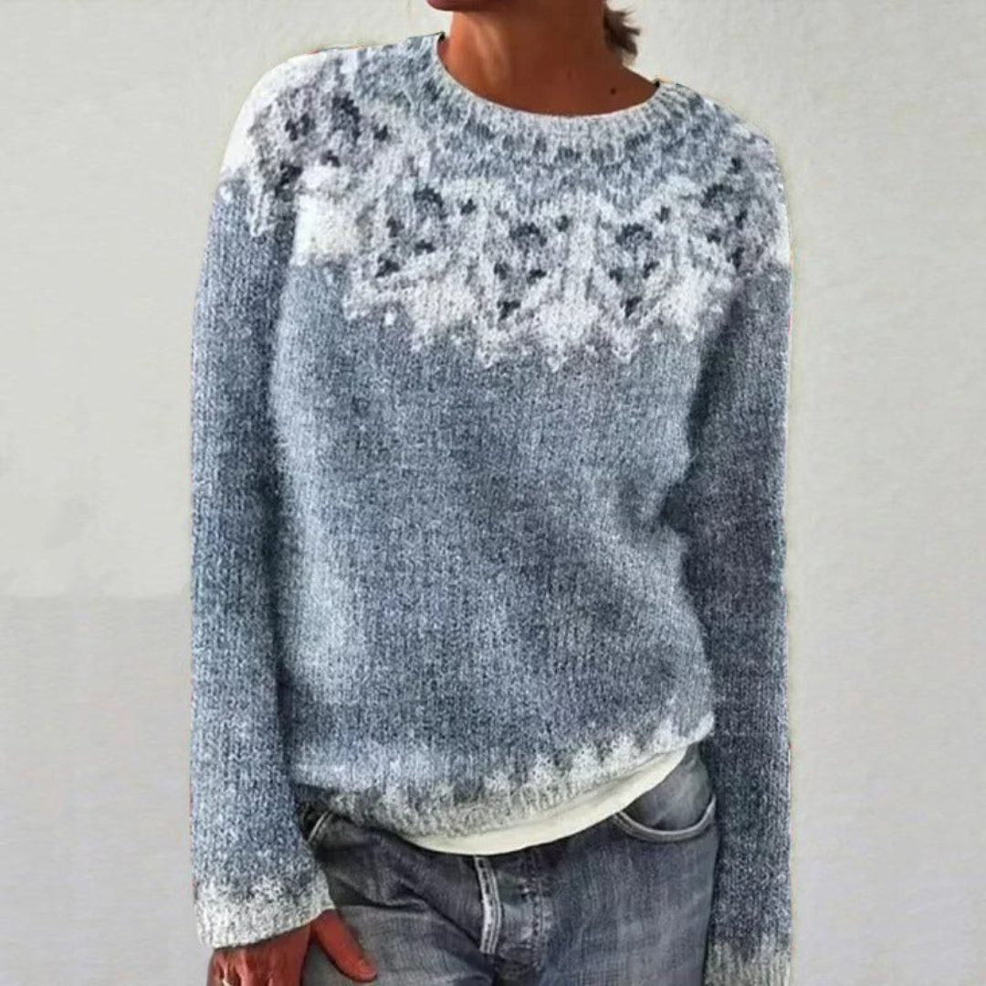 Pull rétro Heather de Danoir Paris, style chic, en coton gris avec détails vintage, visible sur cette image.
