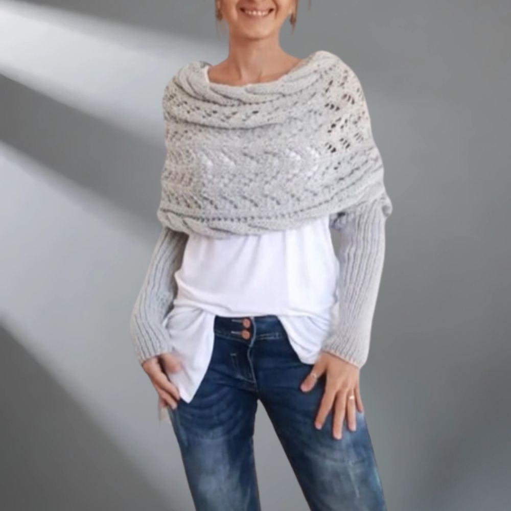 Châle tissé WarmWrap™ de Danoir Paris, élégant et chaud, porté enroulé autour du cou, couleur neutre, texture douce et sophistiquée.