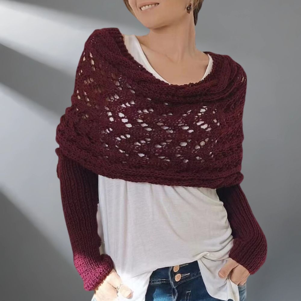 Châle tissé WarmWrap™ de Danoir Paris, élégant et chaud, porté enroulé autour du cou avec des motifs sophistiqués.