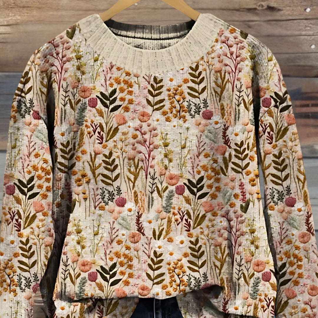 Pull floral élégant Nova FR866 de Danoir Paris, en tissu léger avec motif floral coloré et finition soignée.