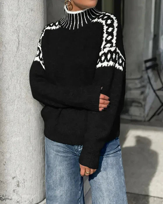 Pull scandinave chic Danoir Paris Liv FR878 en laine douce, détail côtelé et coupe élégante, visible en image.