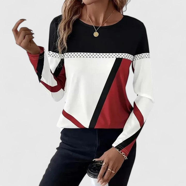 Lena - Top graphique moderne en FR925 de Danoir Paris, tissu élégant avec motifs colorés et coupe tendance visible sur l'image.