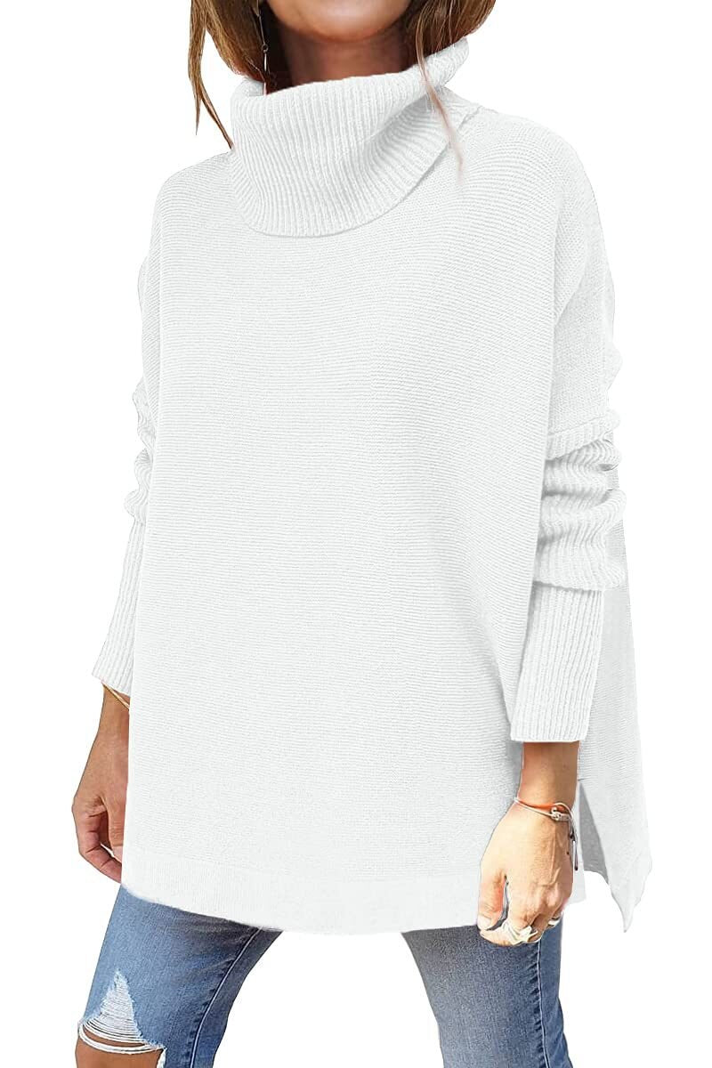Pull chic et douillet Neryssa de Danoir Paris, en tissu doux, porté en mode décontractée, couleur neutre, vue de face.