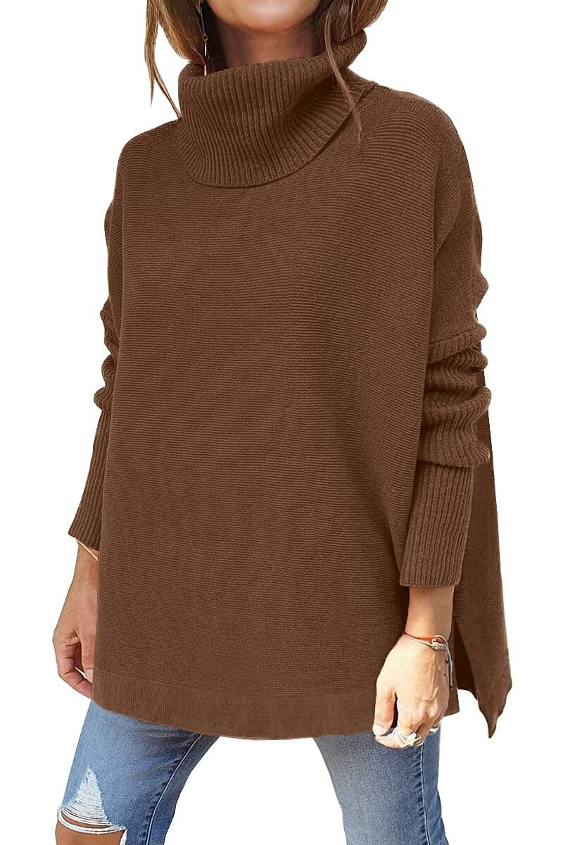Pull chic et douillet Neryssa de Danoir Paris, en tissu doux avec détail élégant, porté par une personne dans un intérieur moderne.