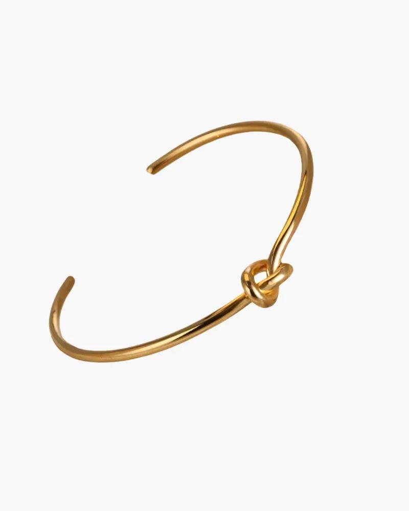 Bracelet Danoir Paris en forme de nœud éternité, orné d’un design élégant en acier inoxydable.