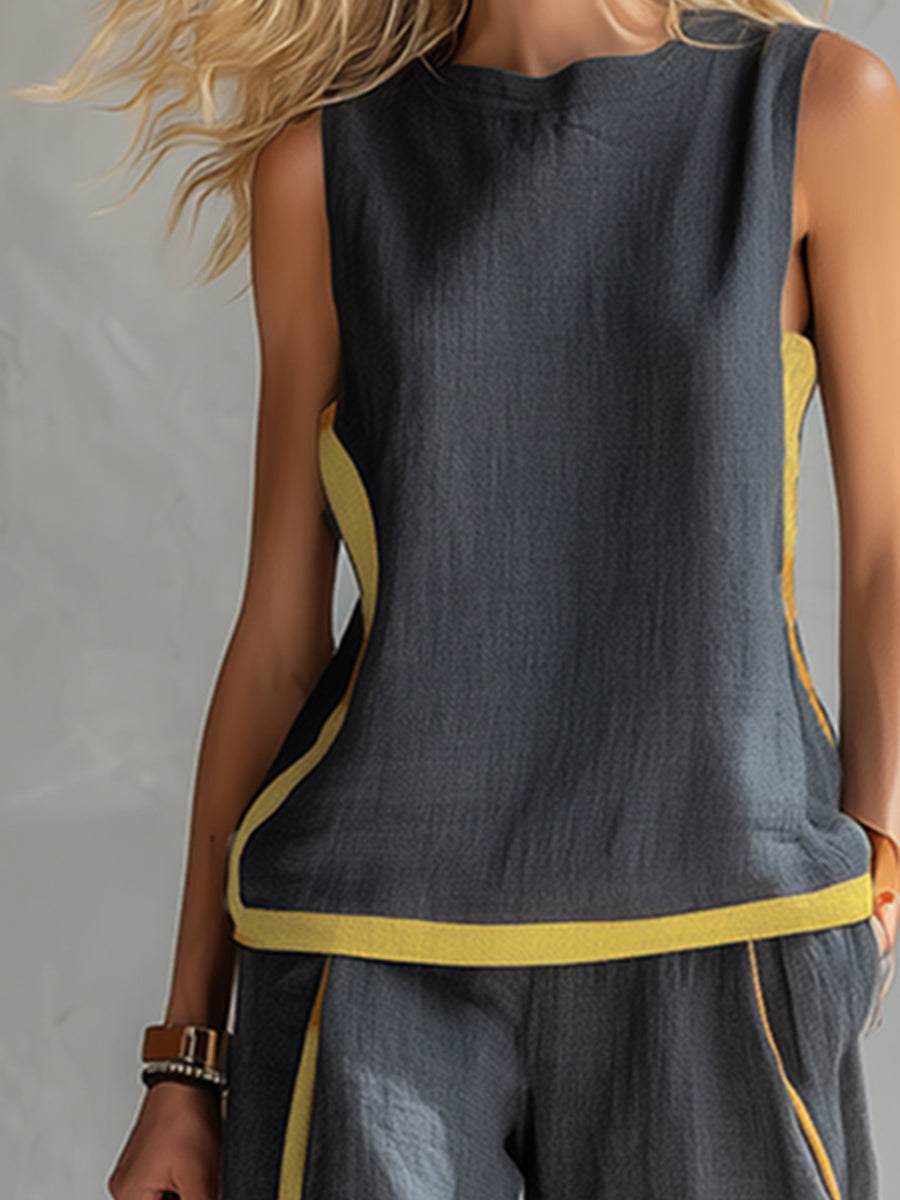 Ensemble deux pièces élégant gris Leila de Danoir Paris, vêtement féminin sophistiqué et moderne présenté sur mannequin.