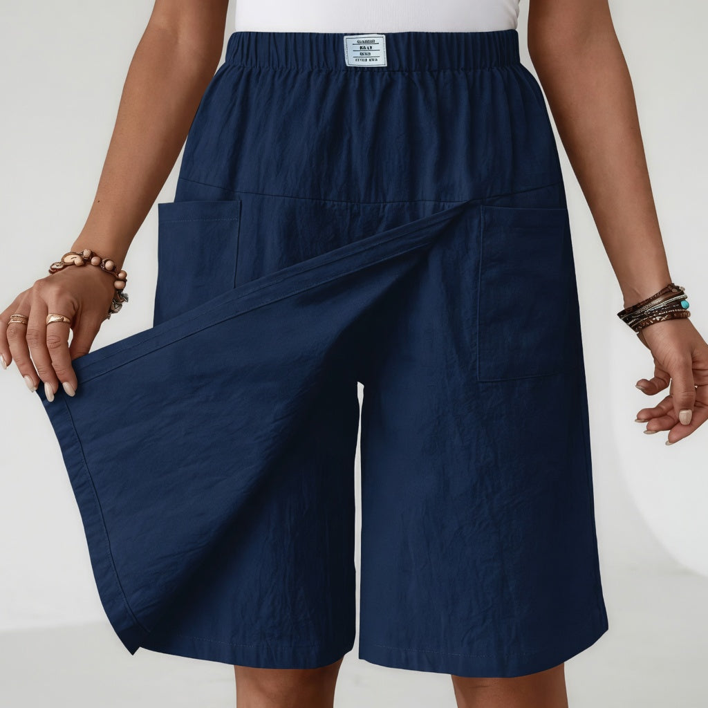 Short en jean Libertine™ de Danoir Paris, taille élastique, poches, couleur bleue, style actif et confortable.